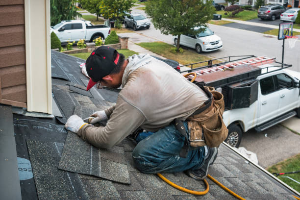 Professional Roof Installation technician working in Andrew, IA